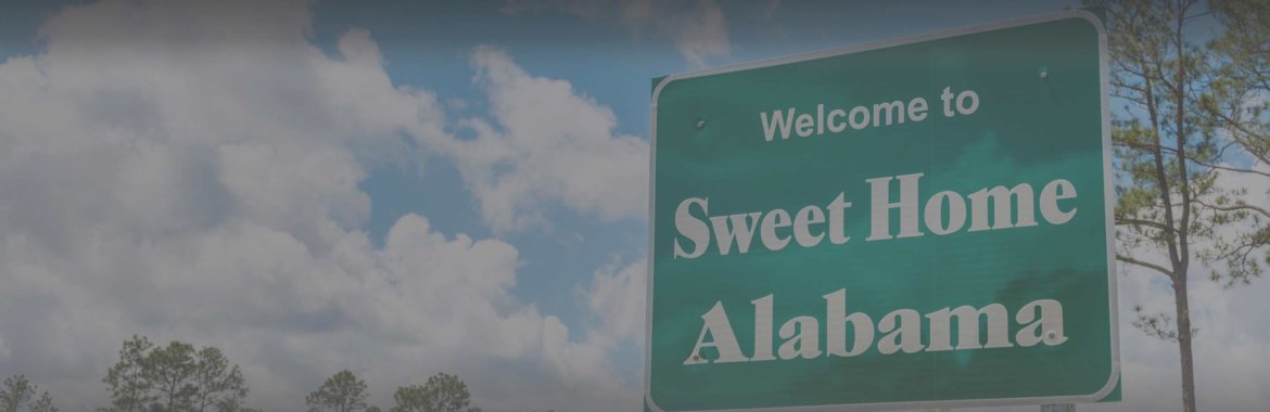 A road sign that says "Sweet Home Alabama."