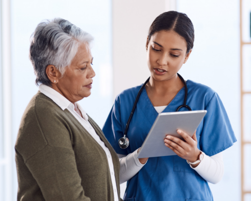 Woman consulting with healthcare provider.