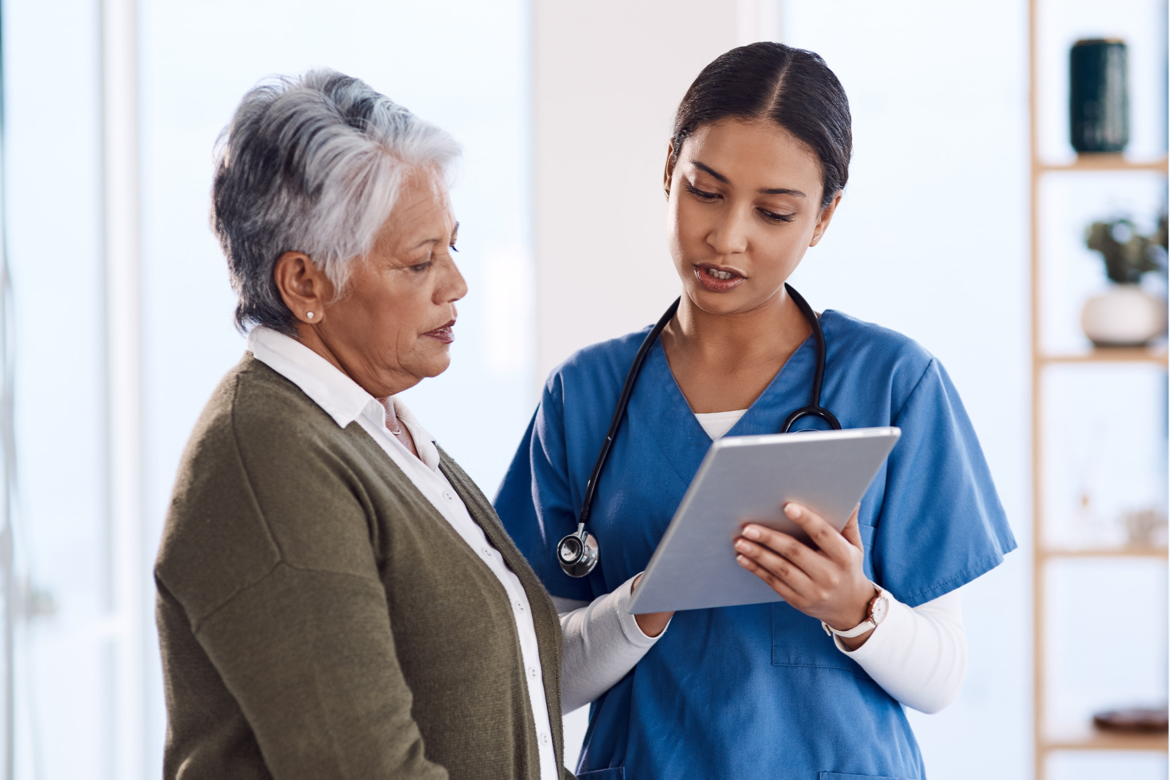 Woman consulting with healthcare provider.