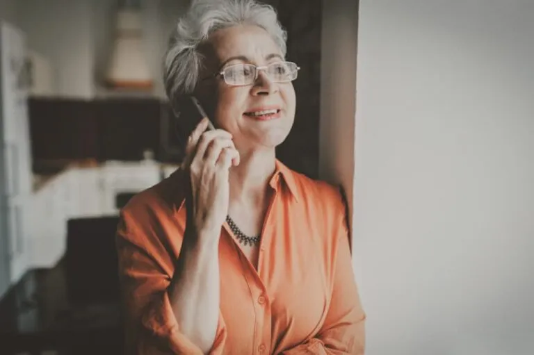 A senior woman making a phone call
