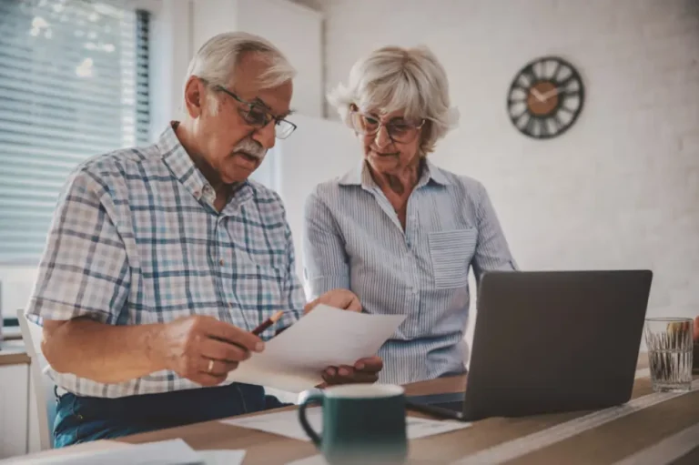 Couple using the Medicare Plan Finder tool to search for coverage.